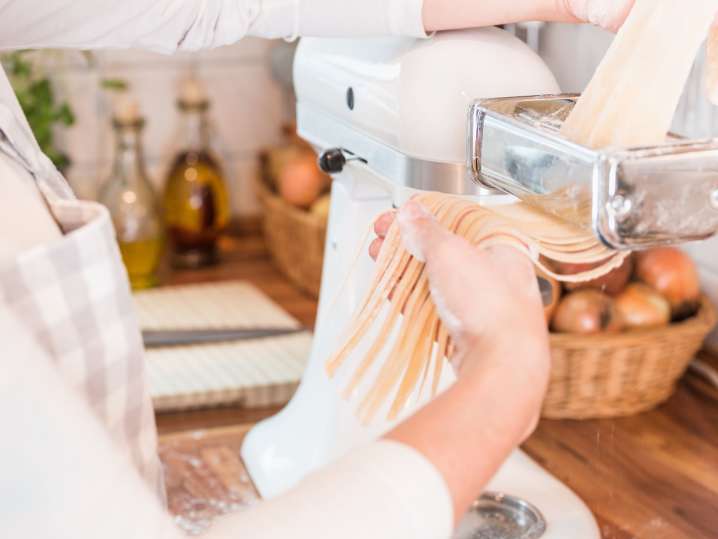 Making handmade pasta with pasta machine Shot