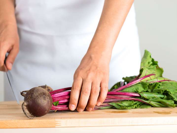 Preparing beets for roasting Shot