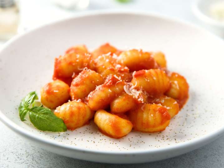 Gnocchi in tomato sauce with basil Shot