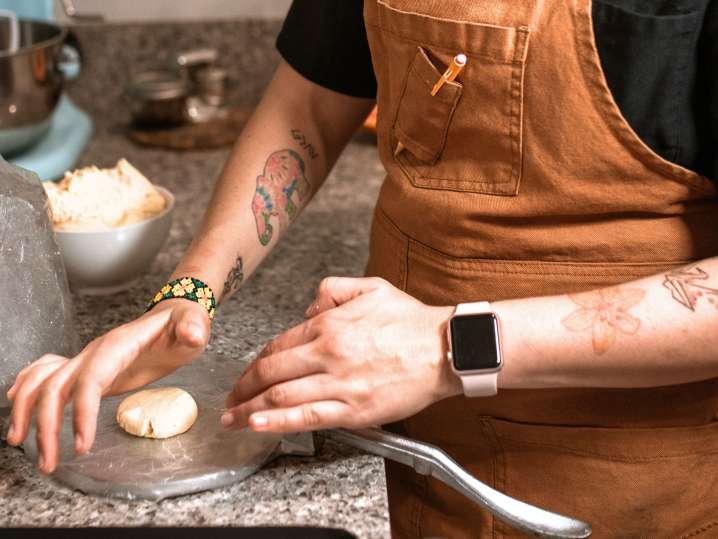 Making fresh tortillas using a press Shot