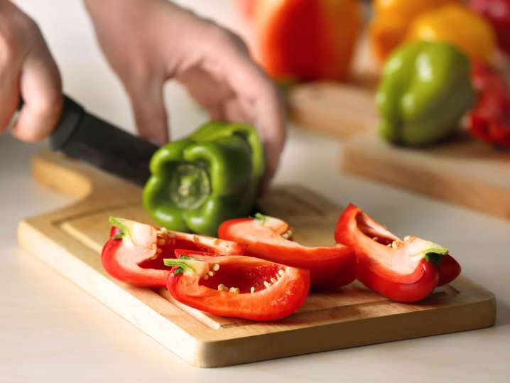 Cutting bell peppers Shot