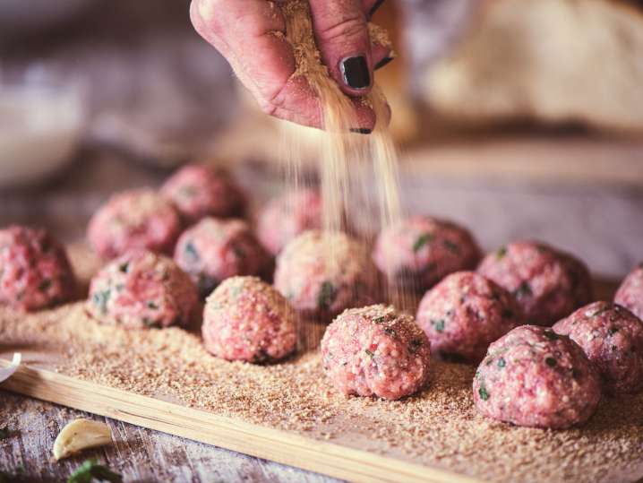 Breading and forming meatballs Shot