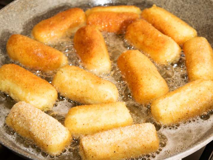 Crisp frying potato croquettes in the pan Shot