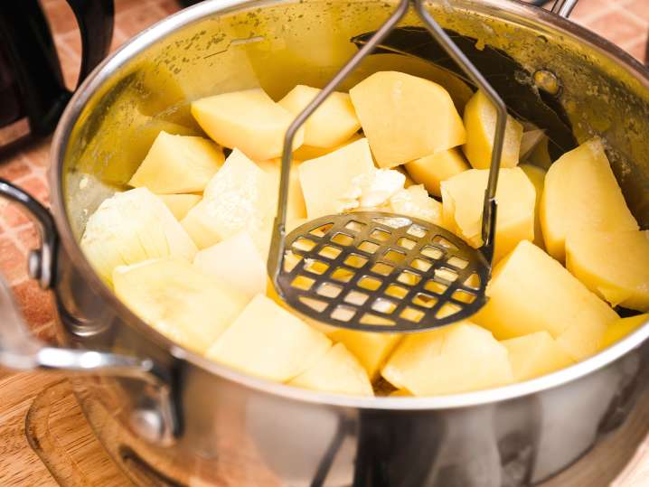 Mashing potatoes Shot