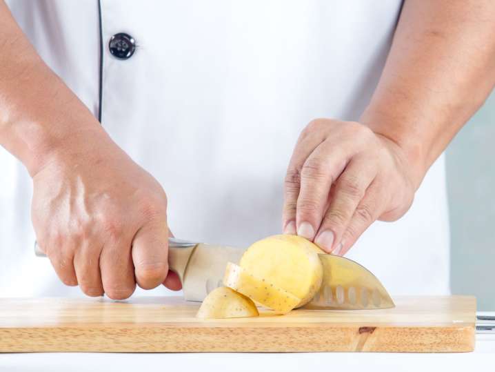 Cutting potatoes Shot