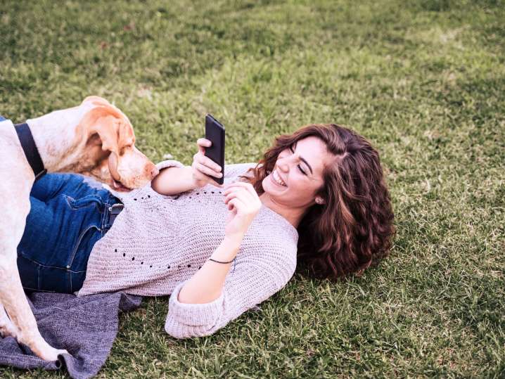 Orlando - a woman taking picture of a dog (2) Shot