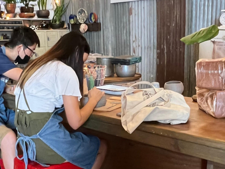 Los Angeles - a couple in pottery class Shot