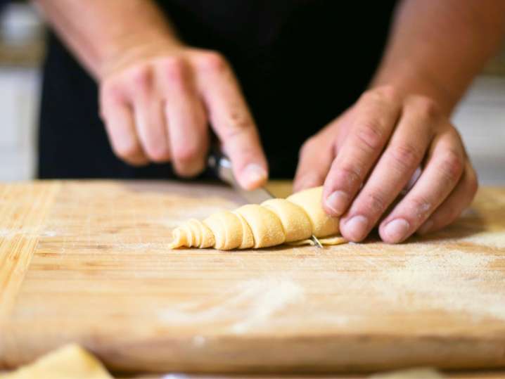 Las Vegas - cutting raw pasta dough in tagliatelle Shot