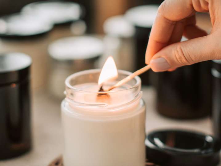 Dallas - Person Lighting The Candle Shot