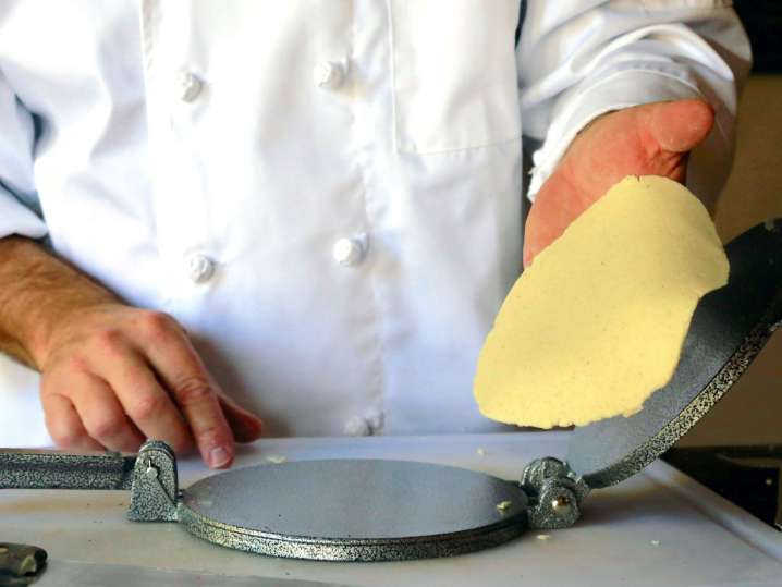 Los Angeles - chef preparing corn tortillas Shot