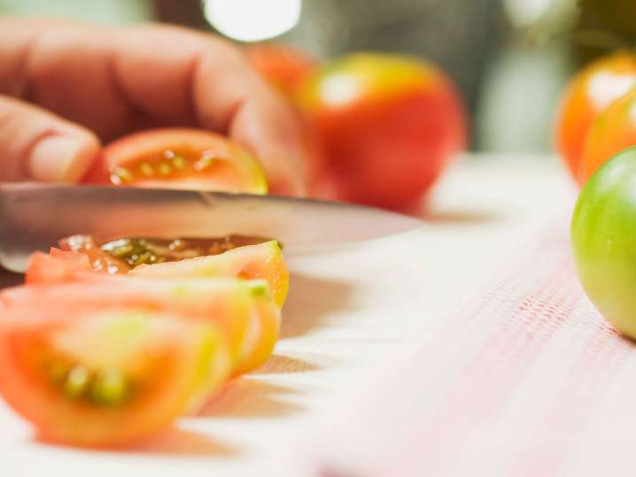 cutting tomatoes Shot