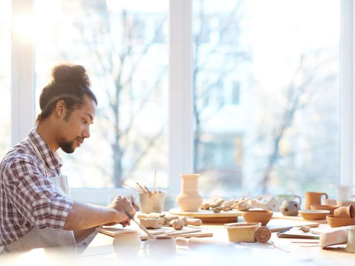 Boston - man creating pottery in handmade pottery class (2) Shot