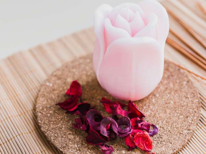 Boston - pink candle with rose petals Shot