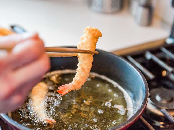 Boston - Close-up of tempura shrimp being fried during a Japanese cooking class Shot