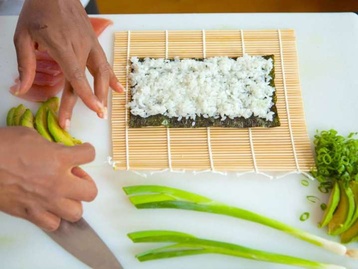 Indianapolis - preparing ingredients for sushi rolling Shot