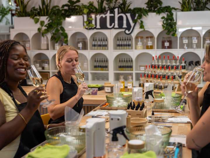 students drinking champagn in art class Shot