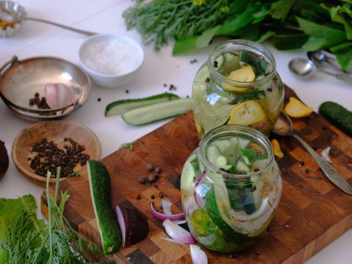 Boston - Sliced Green Vegetable in Clear Glass Jar Shot