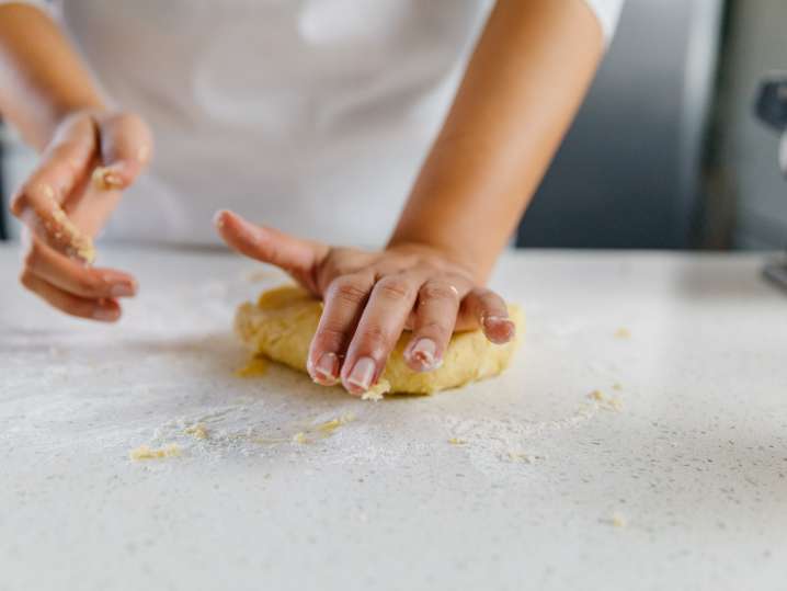 students making pasta dough Shot