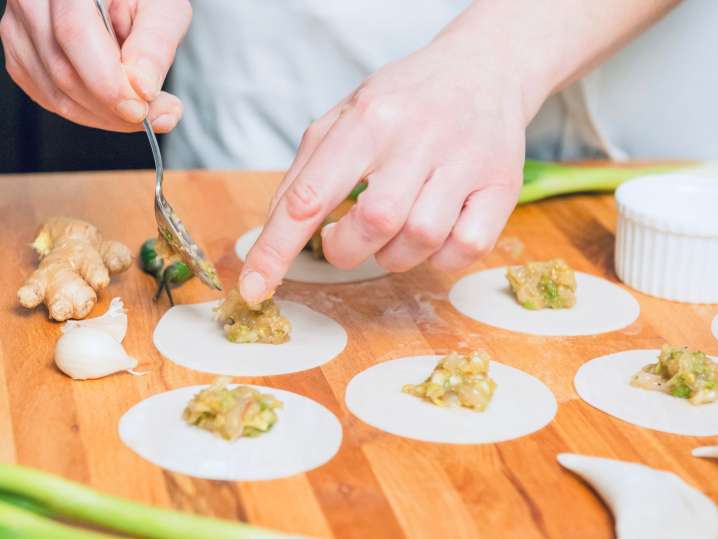 NYC - making dumplings during cooking class Shot