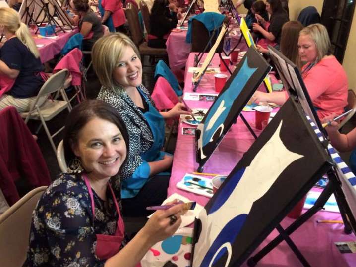 Nashville - women smiling during paint and sip event Shot