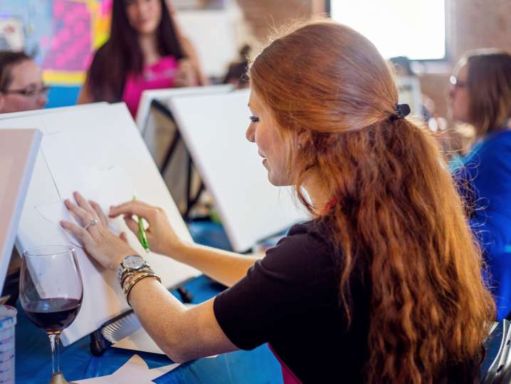 Nashville - a woman painting a canvas Shot