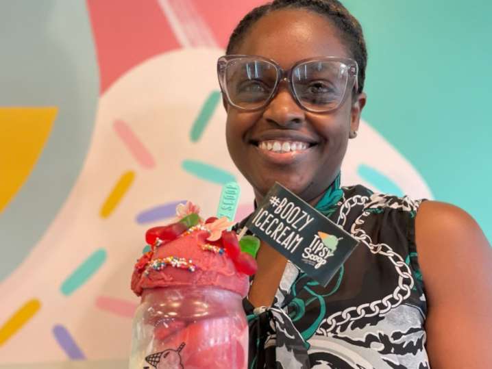 NYC - a woman holding ice cream Shot