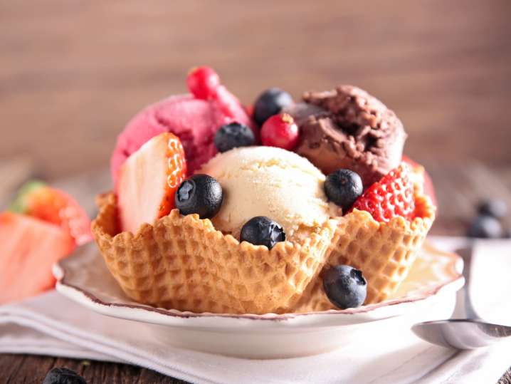 Raleigh - a bowl with ice cream and fruits Shot