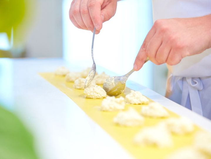 Baltimore - assembling ravioli with ricotta filling Shot