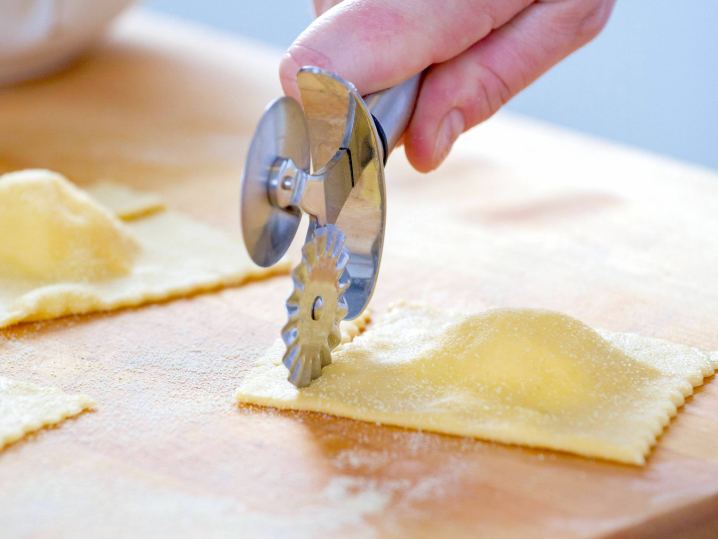 Baltimore - cutting ravioli shape on a wooden board Shot