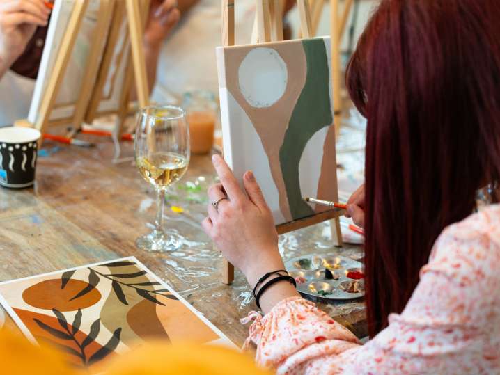 Charlotte - a student paint in paint and sip class Shot