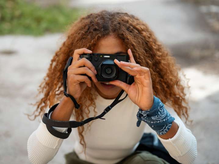NYC - a woman taking pictures Shot