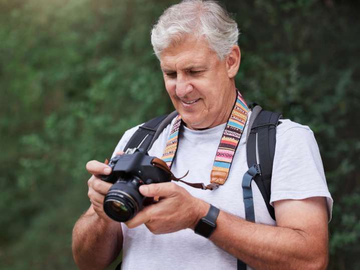NYC - a man taking pictures in a photography class Shot