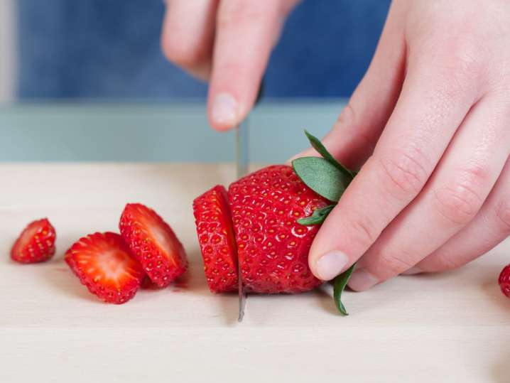 Calgary - cutting strawberries Shot