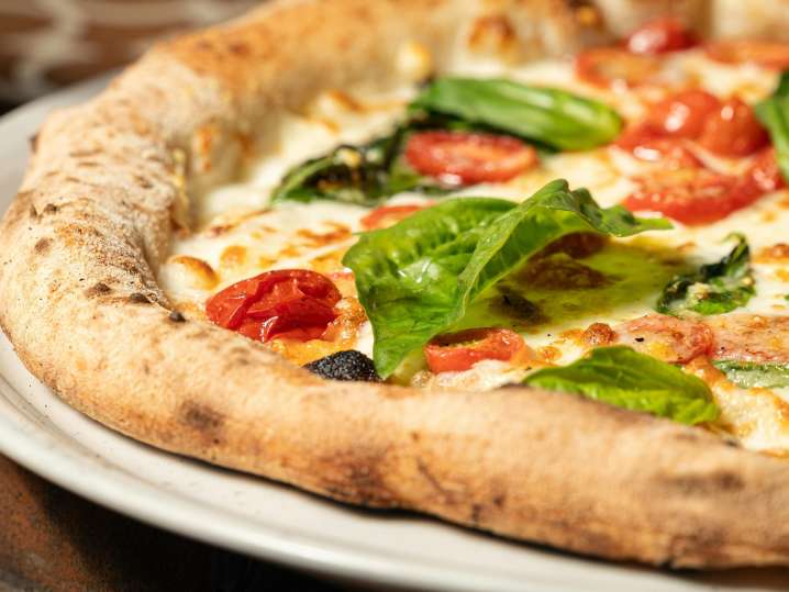 Calgary - margarita pizza up close Shot