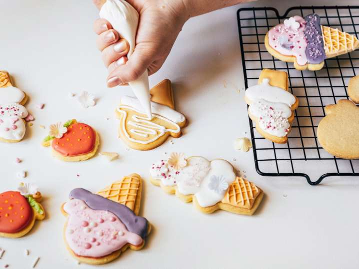 Boston - Assorted decorated sugar cookies with colorful icing during a cookie decorating workshop Shot