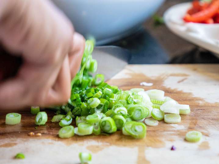 fresh scallions being chopped | Classpop Shot