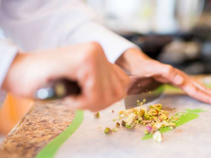 chef cutting pistachios | Classpop Shot