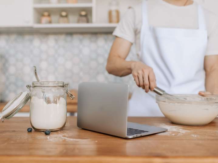 whisking batter during virtual cooking lesson | Classpop Shot