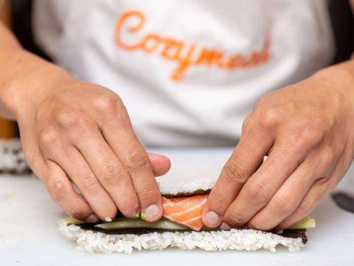 rolling avocado salmon sushi roll | Classpop Shot