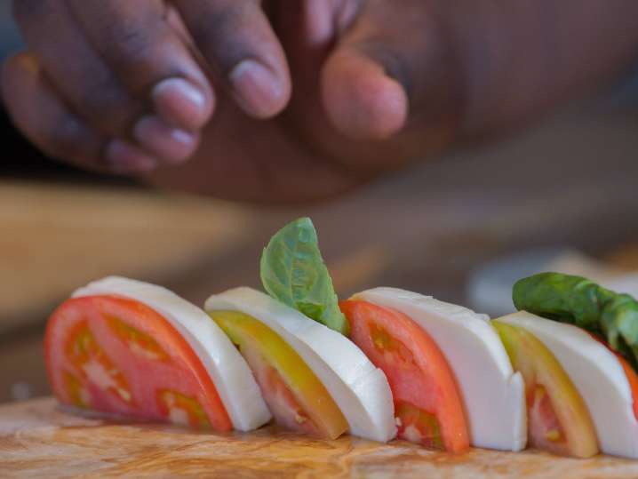 Chef plating Caprese salad | Classpop Shot