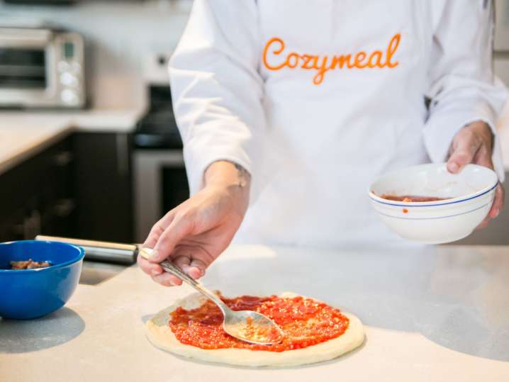 making fresh pizza with tomato sauce base | Classpop Shot