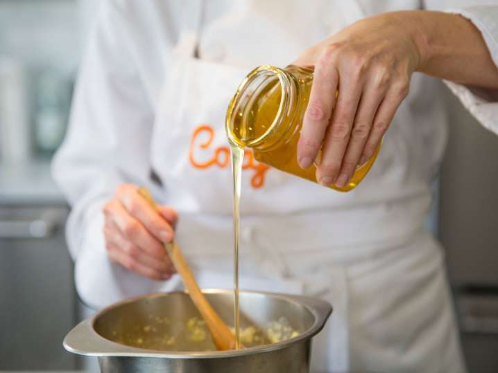 adding syrup to the yogurt mix | Classpop Shot