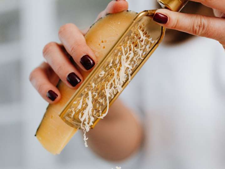 grating Parmesan cheese | Classpop Shot