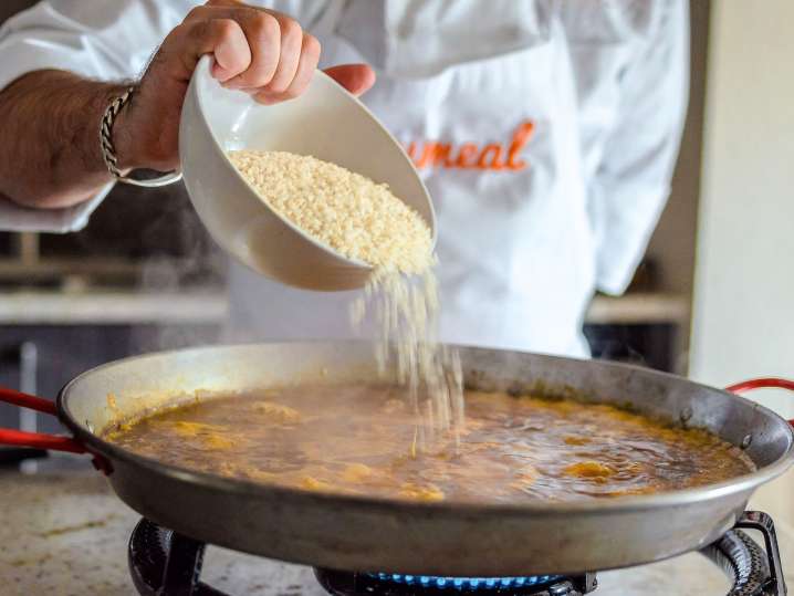 cooking paella the traditional way | Classpop Shot