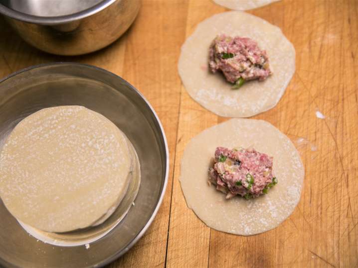 wonton wrappers with pork filling to make dumplings Shot