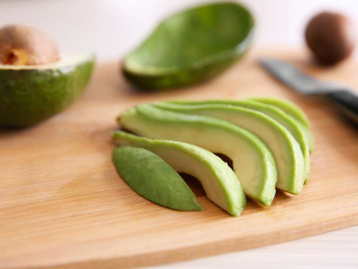 sliced avocado on a cutting board Shot