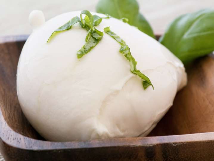 fresh mozzarella ball with basil Shot