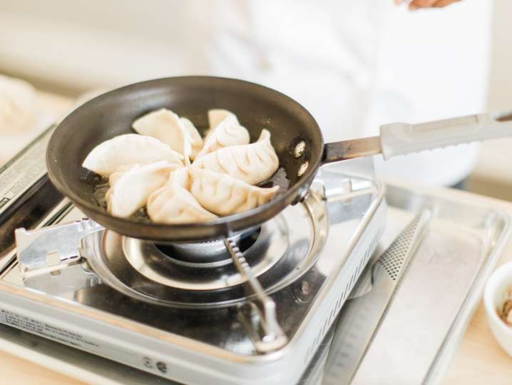 potstickers in a frying pan Shot