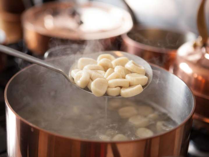 gnocchi boiling in pot of water Shot