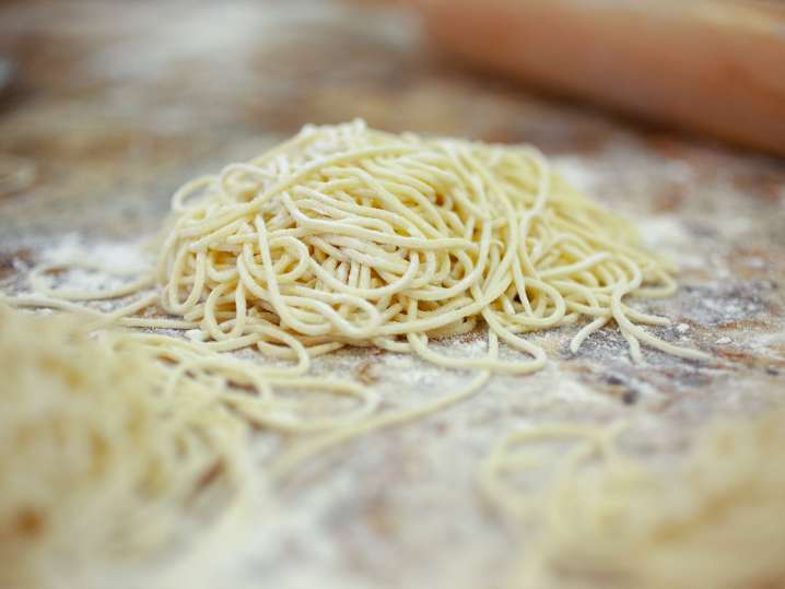 homemade ramen noodles on a floured work surface Shot